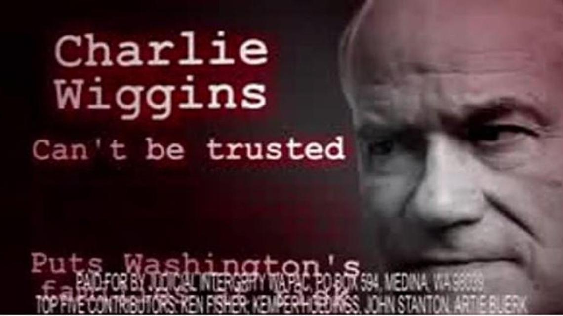 An ad lodged against state Supreme Court candidate Charlie Wiggins. Wiggins, the incumbent, is facing Federal Way Municipal Court Judge Dave Larson.