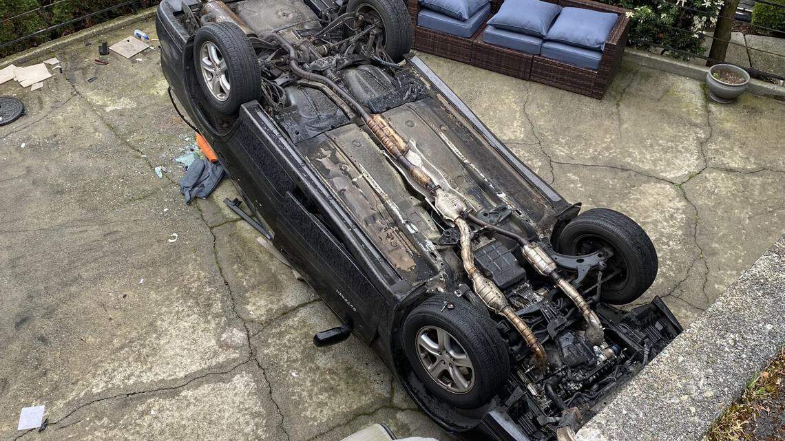 Rescuers rushed to free an injured 77-year-old man trapped inside his car.