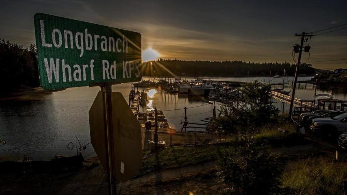 The sun rises at the Longbranch Marina in the Key Peninsula on Monday. Temperatures throughout the South Sound are expected to rise to 90 degrees this weekend for the first time in 2016.