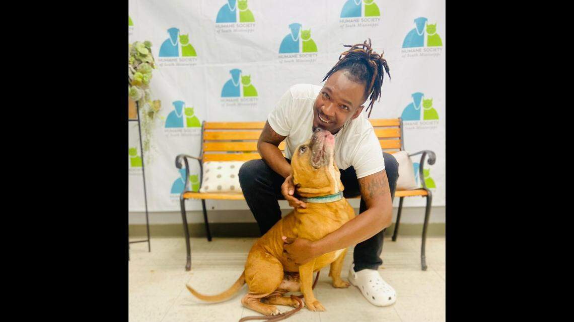 Michael Cook Jr. and Alex the dog are back together after their dad died.