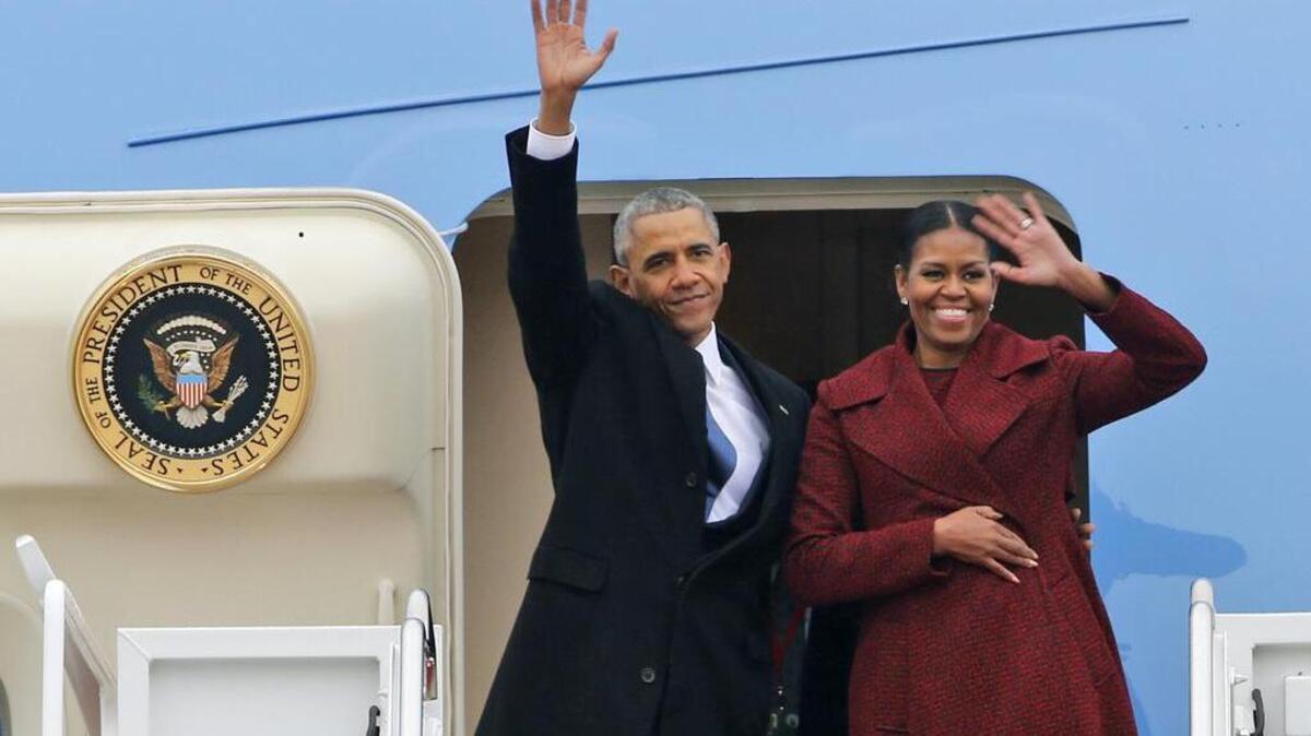 Leaving on a jet plane ... but now they’re back again. Former President Barack Obama and wife Michelle give Five Spot salutes before departing Andrews Air Force Base in Maryland at the end of the Obama administration.