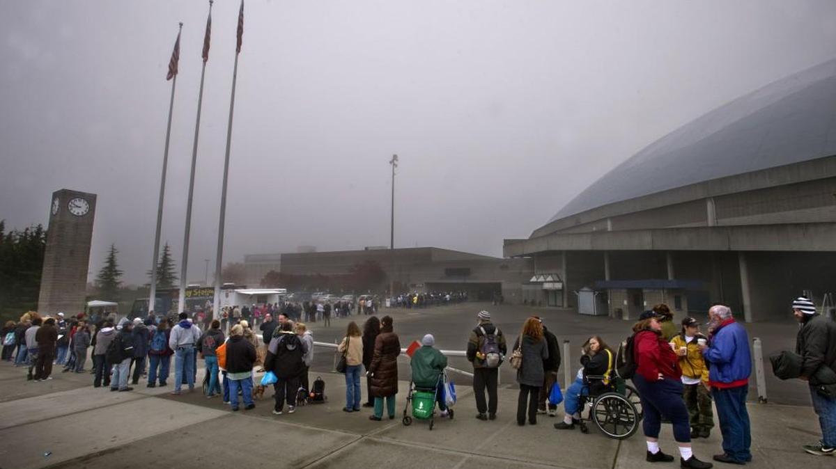 POVERTY: How deep is it in Pierce County? A long line of people seeking services outside the annual Homeless Connect event at the Tacoma Dome offers a visual clue.