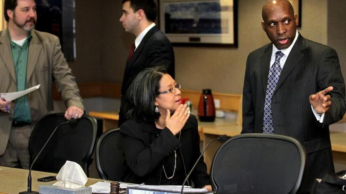 City Manager T.C. Broadnax (right) talks with Mayor Marilyn Strickland before a study session with City Council members early in his Tacoma tenure. Broadnax came to Tacoma from Texas and will soon return there.