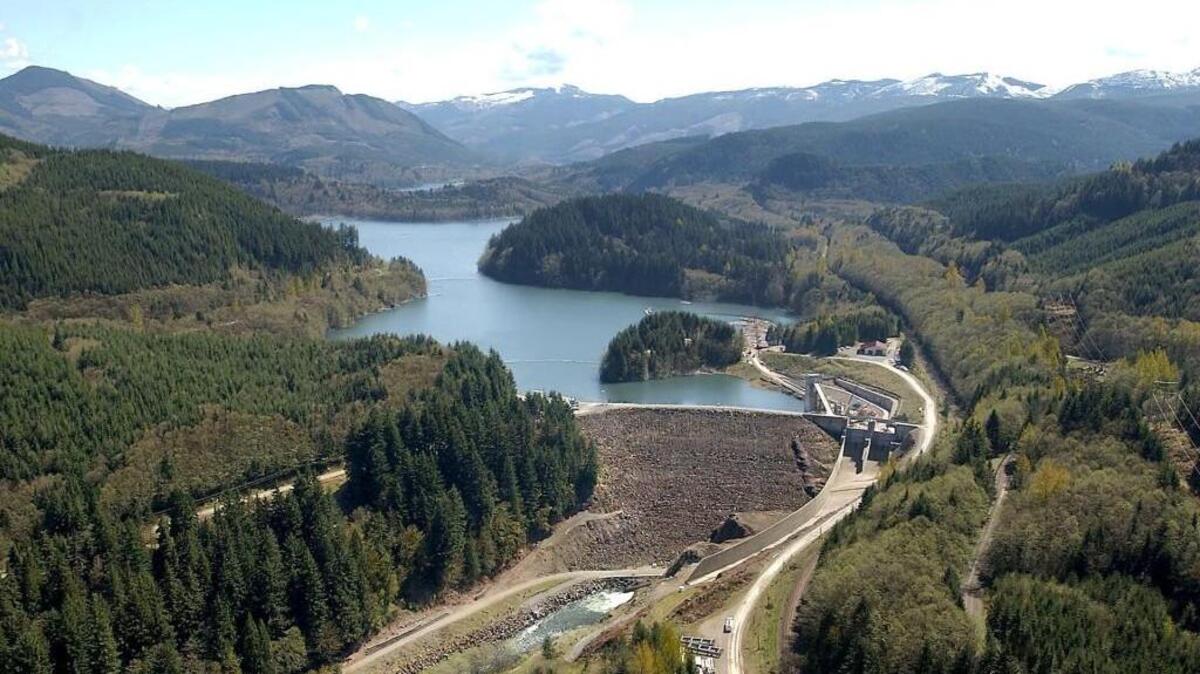 Howard Hanson Dam and Eagle Gorge Reservoir on the Green River are shown in 2005, at a time of record-low snowpack on the peaks. Tacoma gets its water from a diversion dam downstream from here. Activists cite drought conditions as part of the reason for wanting to restrict new Tacoma industrial and commercial water users who want to use more than 1 million gallons a day.