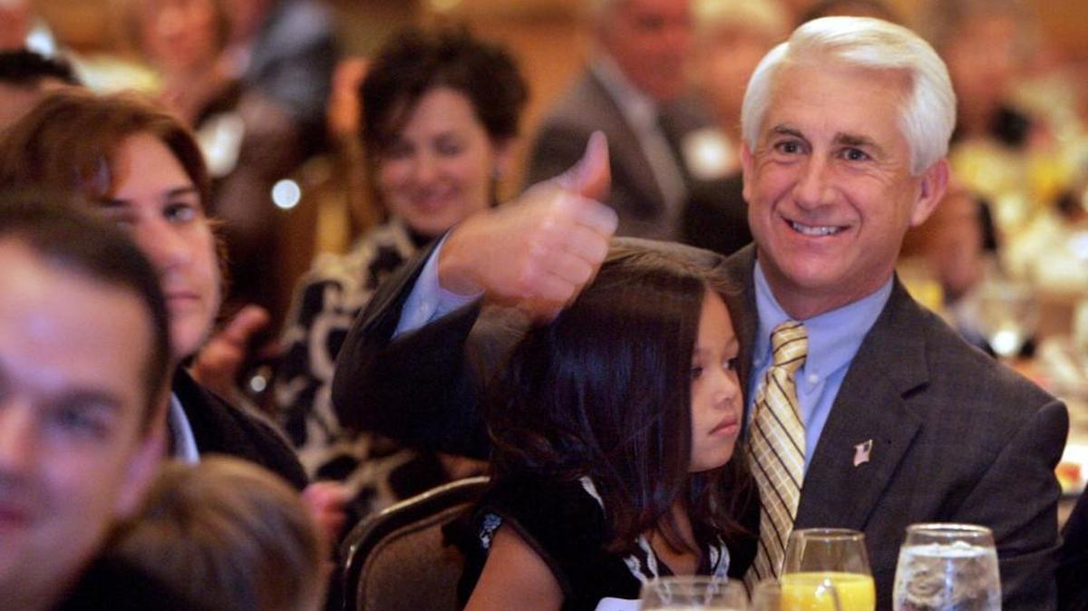 U.S. Rep. Dave Reichert sits with his granddaughter Emma Bussey during a reelection fundraiser breakfast in Bellevue in 2008. Spending more time with family is the main reason he’s not running again next year, Reichert told The News Tribune.