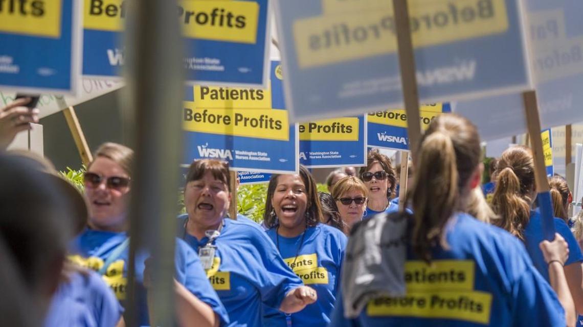 Nurses participate in an informational picket in front of Multicare's Tacoma General Hospital, June 27, 2016.