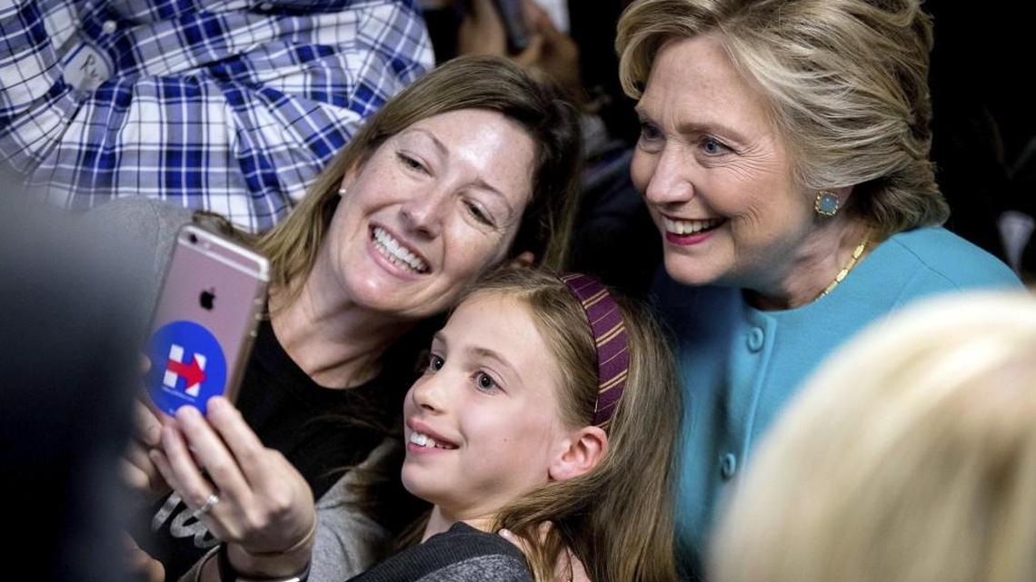 Democratic presidential nominee Hillary Clinton takes a photograph with supporters at a campaign office in Seattle this month. Clinton is The News Tribune’s choice for commander in chief.