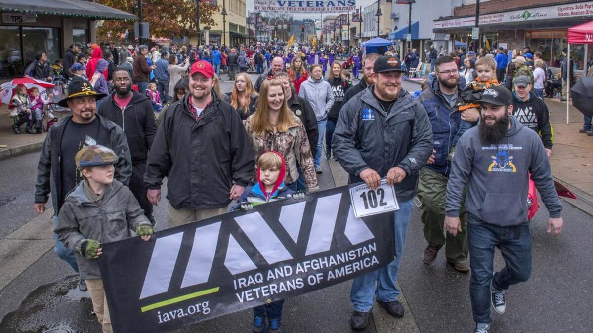 A group representing the Iraq and Afghanistan Veterans of America participate in the 50th Annual Veterans Day Parade in Auburn Nov. 7, 2015. Membership has declined in many veterans organizations along with the veterans population.