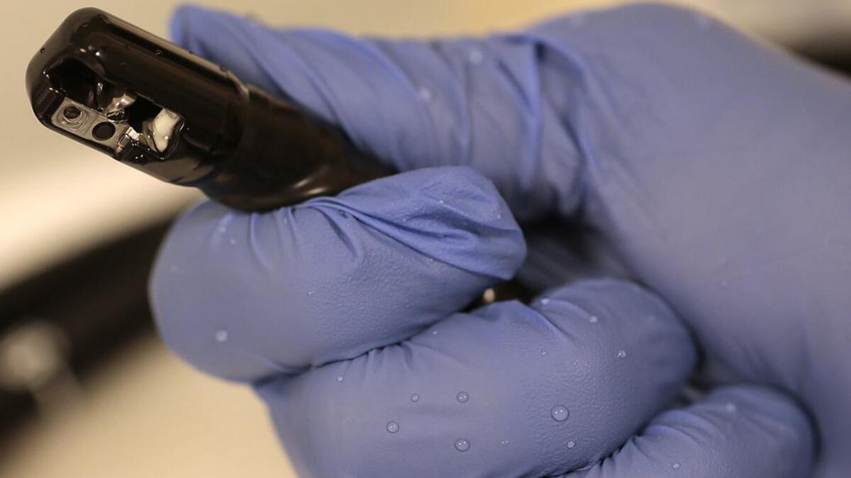 An Olympus duodenoscope is cleaned at LA County/USC Medical Center in November 2015. The tip of the scope contains a camera lens and an articulated scoop, sites that have proven difficult to clean and disinfect.