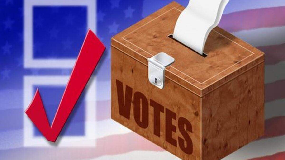 1 col x 1.535 in / 52x39 mm / 177x133 pixels  Image of ballot box with check mark next to it, superimposed over U.S. flag. KRT 2000