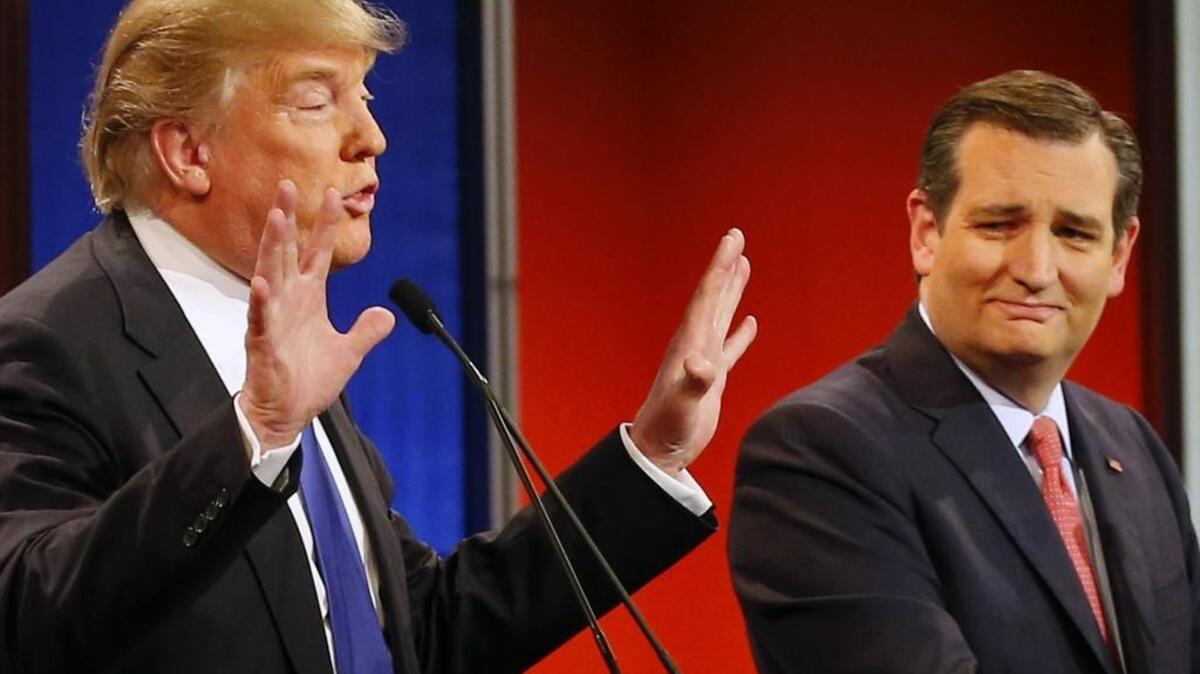 Republican presidential candidate Ted Cruz, right, reacts as businessman Donald Trump speaks during a March 3 presidential primary debate in Detroit, Michigan. They are competing in the May 24 Washington presidential primary, for which ballots go out in the coming week.