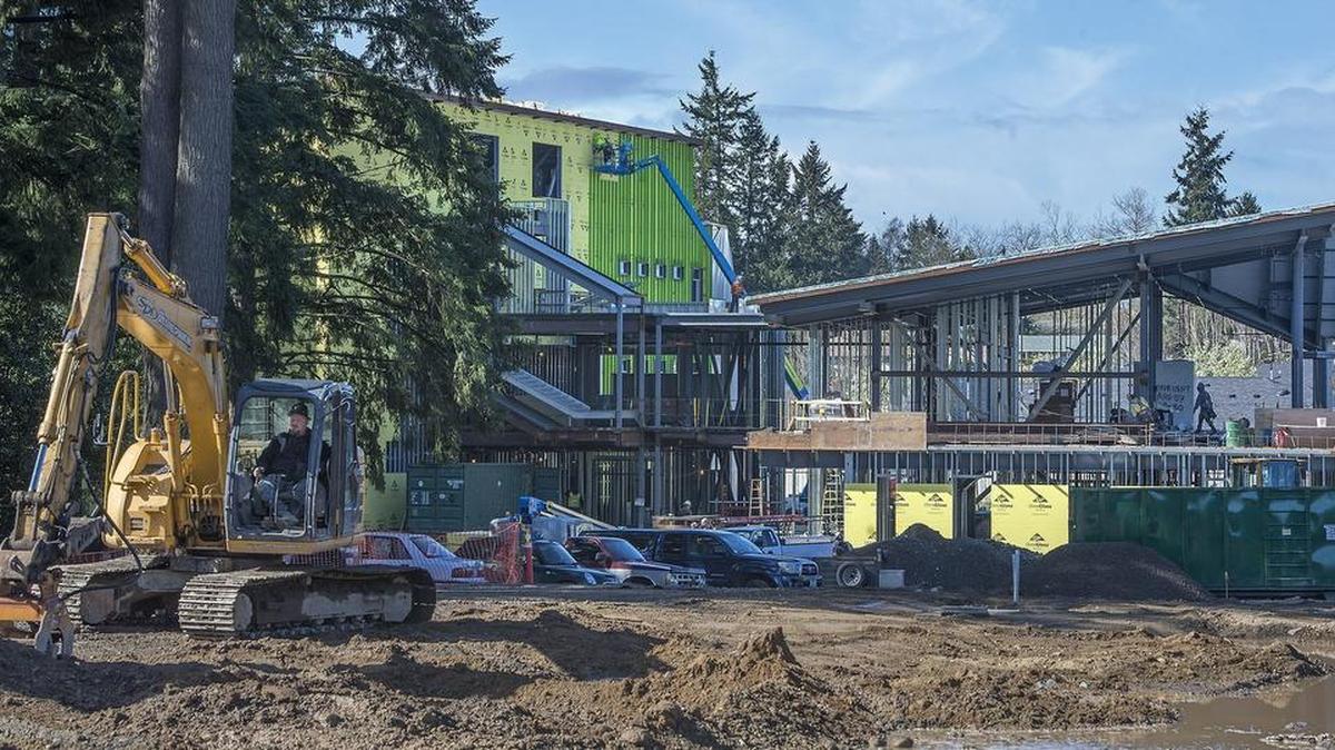Construction work continued at the Wainwright Intermediate School in Fircrest in March. Tacoma School District officials now say the school, which was scheduled to open this fall, will not be ready until January.