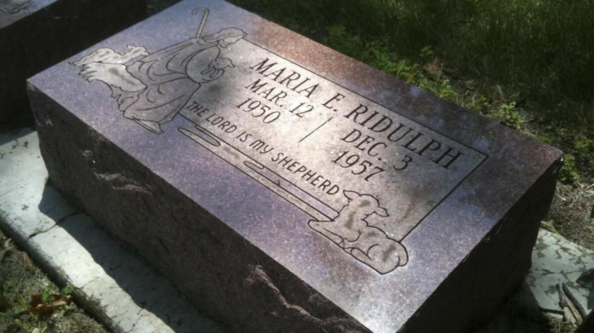 The grave marker of 7-year-old Maria Ridulph is seen at Elmwood Cemetery in Sycamore, Ill. Jack McCullough, 75, is serving a life sentence after being sentenced for Maria's 1957 death. An Illinois judge is considering whether to accept a prosecutor's conclusion that McCullough could not have committed the murder.