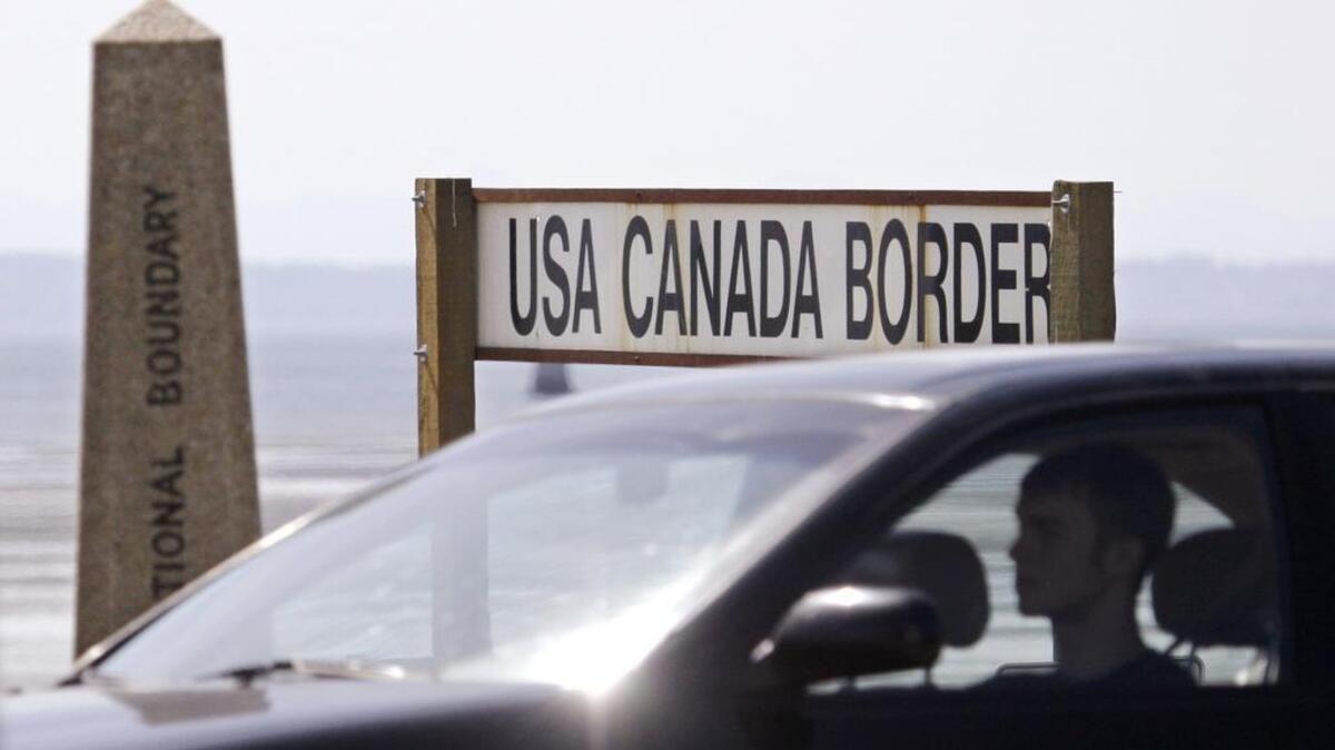 A driver heads toward the U.S. at the border crossing with Canada in Blaine. Rules regarding ID needed to enter the U.S. have ratcheted up since 9/11.
