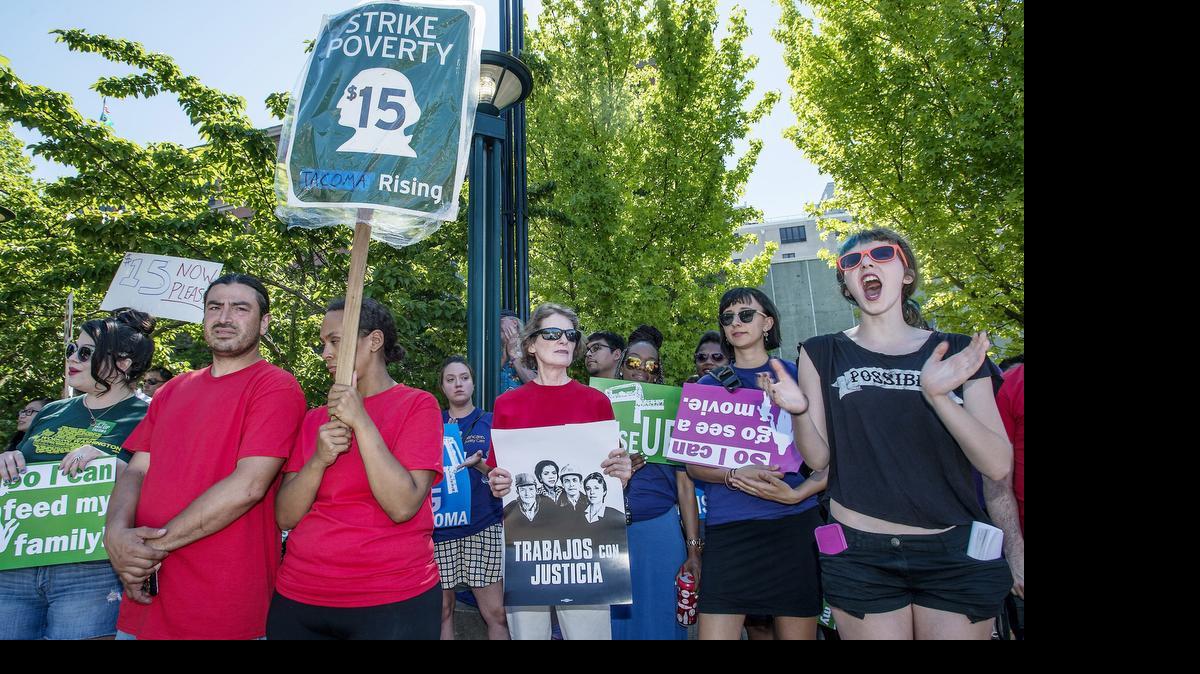 
Members of 15 Now Tacoma joined Raise Up Tacoma, labor activists and union members June 30 for a rally in Tacoma supporting a $15 minimum wage.
