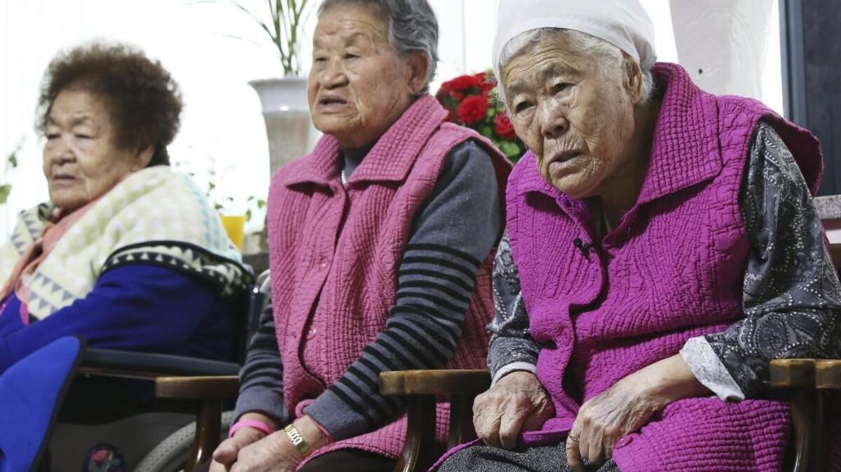 Former South Korean sex slaves, who were forced to serve the Japanese Army during World War II, wait for results of a Monday meeting of South Korean and Japanese foreign ministers at the Nanumui Jip, The House of Sharing, in Gwangju, South Korea. The foreign ministers said Monday they had reached a deal meant to resolve a decades-long impasse over Korean women forced into Japanese military-run brothels during World War II, a potentially dramatic breakthrough between the Northeast Asian neighbors and rivals.