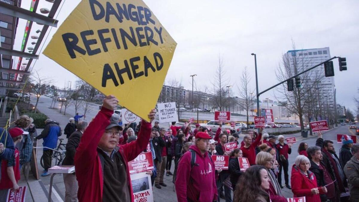 Tacoma resident Chun Yu said he is against the proposed methanol plant because he feels it will deplete the area's water supply, pollute the air and pose numerous security threats to the region. Approximately 100 demonstrators attended this rally on Feb. 24. On Tuesday, the developer canceled plans for the project.