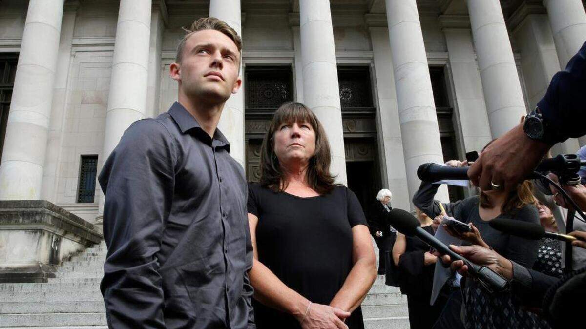 Stephanie McCleary and her son Carter, 17, talk to reporters in September 2016 following a Washington State Supreme Court hearing on the long-running battle over the state's constitutional requirement to properly fund basic education. Carter was a 7-year-old second grader when the family from Chimacum first sued the state. The McCleary case was finally closed this month.