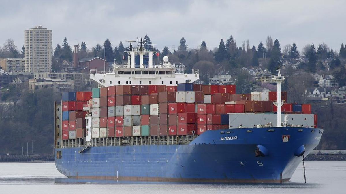 
A cargo ship sits anchored in Commencement Bay near the Port of Tacoma in February. A new trade pact, if approved by Congress, would be a trade boon for Washington state.
