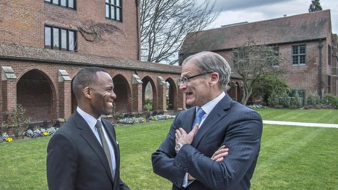 Isiaah Crawford, left, chats with University of Puget Sound President Ronald R. Thomas on Friday. Crawford, the provost at Seattle University, has been appointed to replace Thomas, who retires this year.