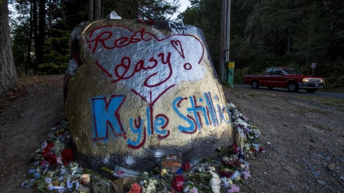 A memorial for Kyle Stillion is seen outside of Peninsula High School. Classes were canceled Monday — and a second rock was painted — after another Peninsula student, James Oatridge, died in a car accident Sunday.