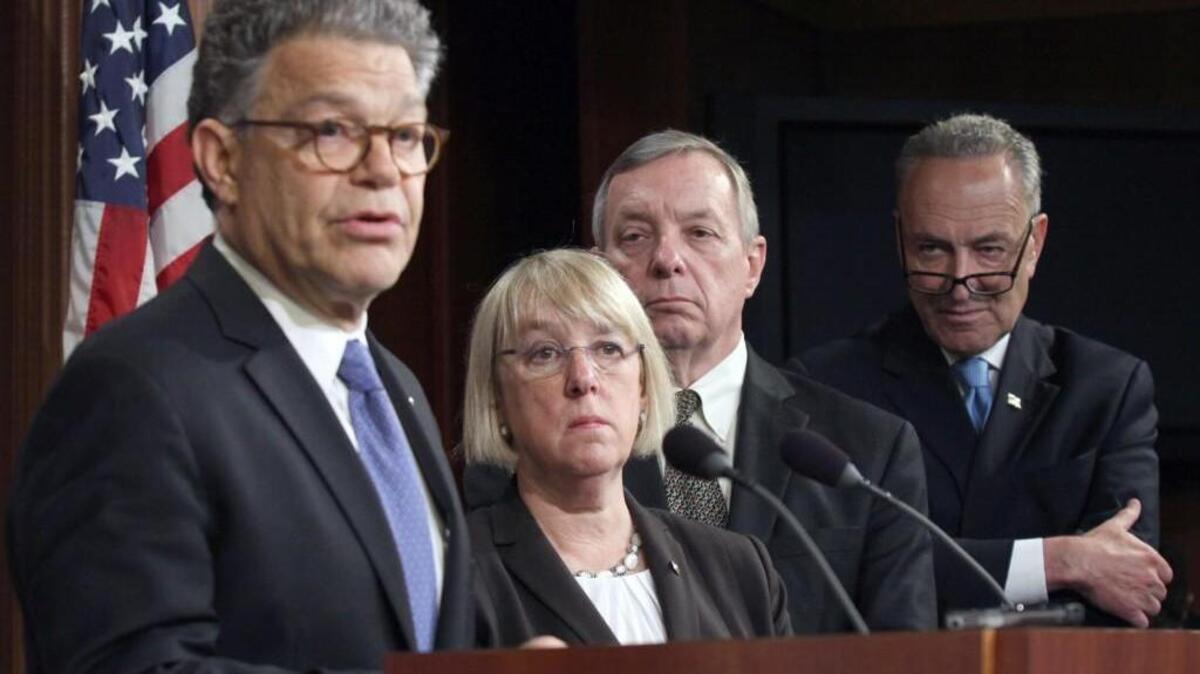 During better days, Sen. Al Franken, D-Minn., speaks about student loan legislation at a Capitol Hill news conference with fellow Democratic senators Patty Murray, Richard Durbin and Chales Schumer.