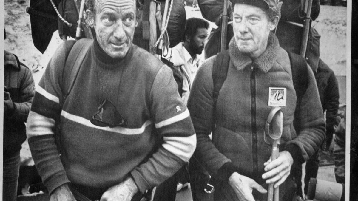 Jim Whittaker, right, and twin brother Lou pause after descending from Camp Muir on Mount Rainier in June 1981. The brothers were part of a rescue party that searched for the bodies of 11 missing climbers buried by a wall of ice. Lou Whittaker died Sunday at age 95.