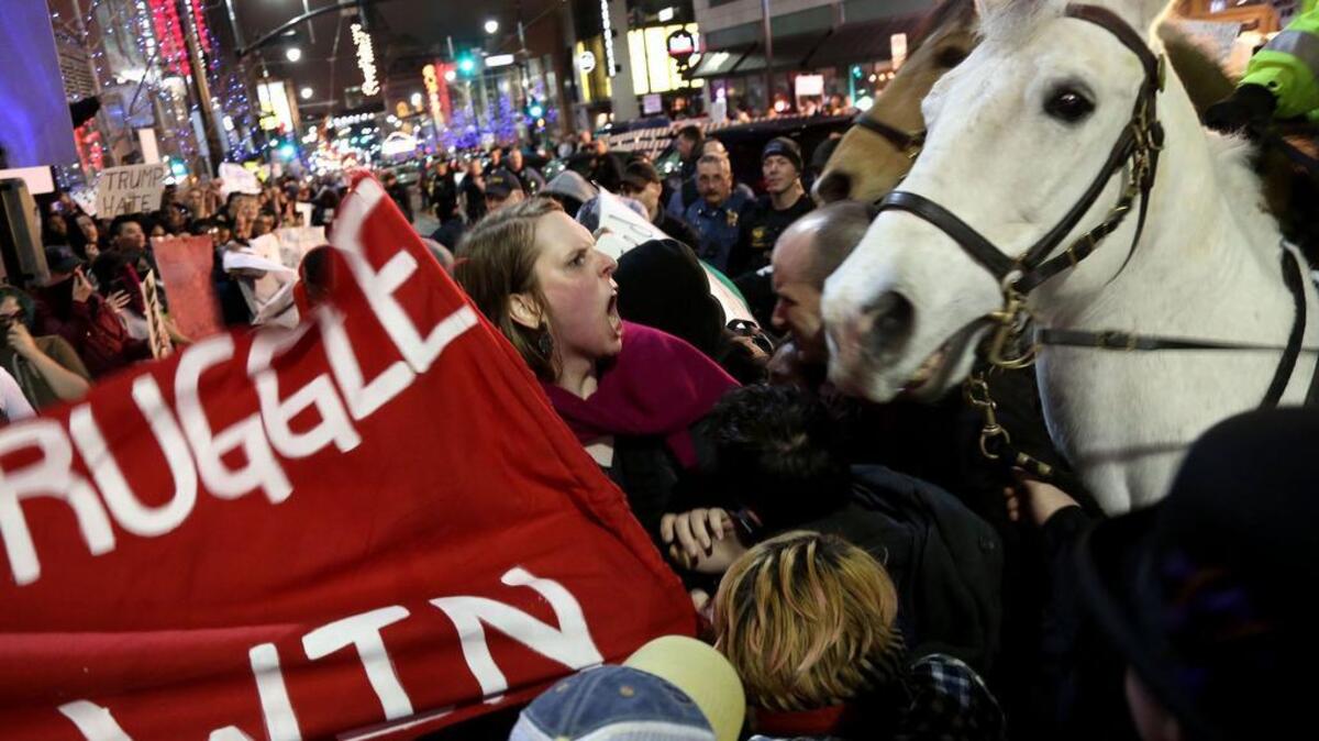 A protester yells at police outside a March 12 rally for Republican presidential candidate Donald Trump in Kansas City, Missouri.