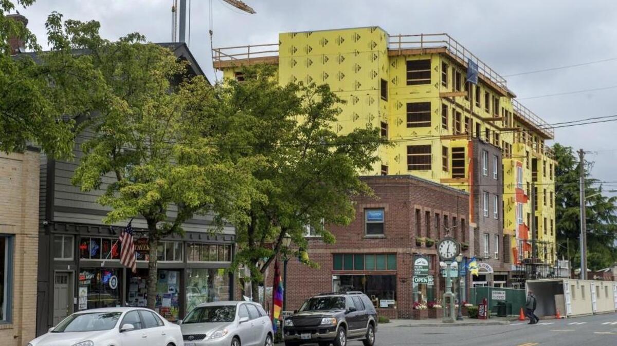 Proctor Station, the large mixed-use building across from Mason Middle School, is shown while construction was under way in May 2015.