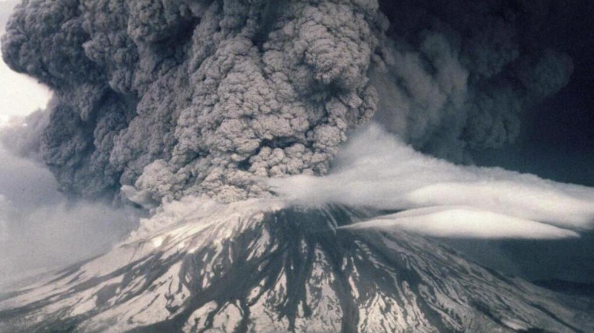 Mount St. Helens erupts at 8:32 a.m. on Sunday, May 18, 1980.