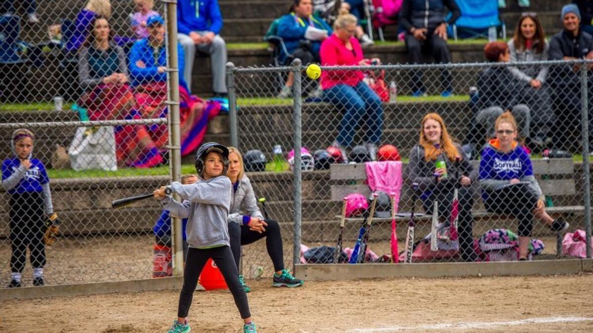 Taylor Trial waits for a pitch in May 2015 in a league softball game. Youth sports are among the University Place recreation programs that would be funded by creation of a metropolitan park district.