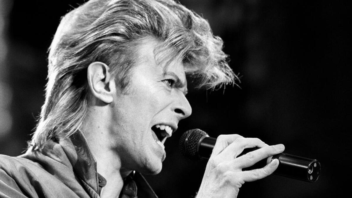 1987 file photo shows David Bowie in concert. Bowie, the other-worldly musician who broke pop and rock boundaries with his creative musicianship, nonconformity, striking visuals and a genre-bending persona he christened Ziggy Stardust, died of cancer Jan. 10. He was 69 and had just released a new album.