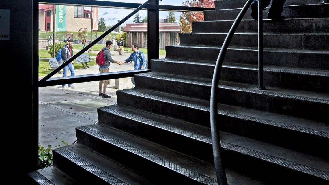 Students greet each other and head to class at the Pamela Transue Center for Science and Engineering on the Tacoma Community College campus. Transue was a long-time TCC president; her replacement, Sheila Ruhland, recently resigned after less than two years in the post.