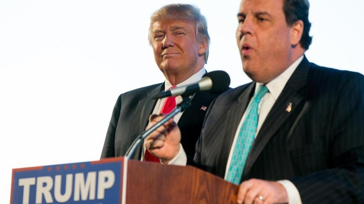 New Jersey Gov. Chris Christie, right, introduces Republican presidential candidate Donald Trump at a rally at Millington Regional Airport in Millington, Tennessee on Feb. 27.
