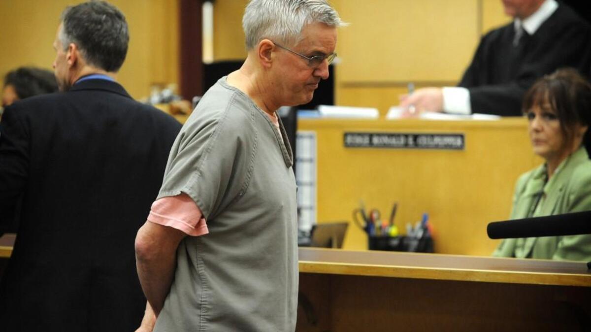 Steven Powell leaves a courtroom in Pierce County Superior Court in 2012, the year he was sentenced to 30 months in prison for voyeurism.