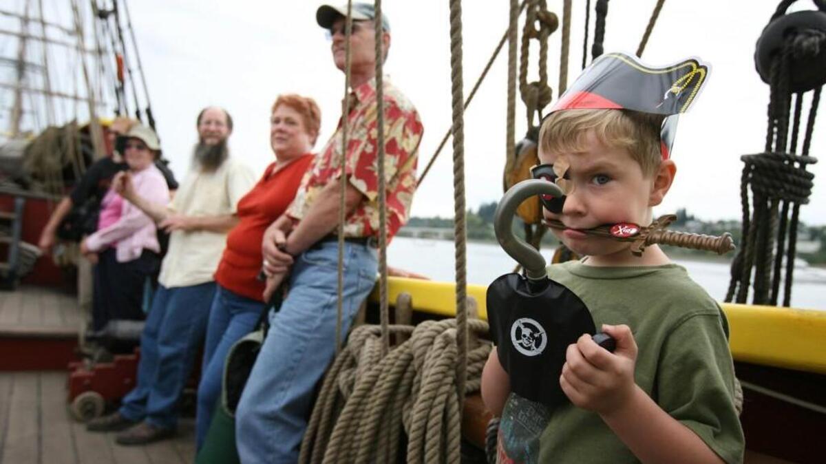Donning his finest pirate gear, Ashton Krajeski waits aboard the Lady Washington with other passengers as they prepare to take a tour of the South Sound. The Grays Harbor-based ship is one of nearly two dozen invited to this weekend’s Festival of Sail Tacoma.