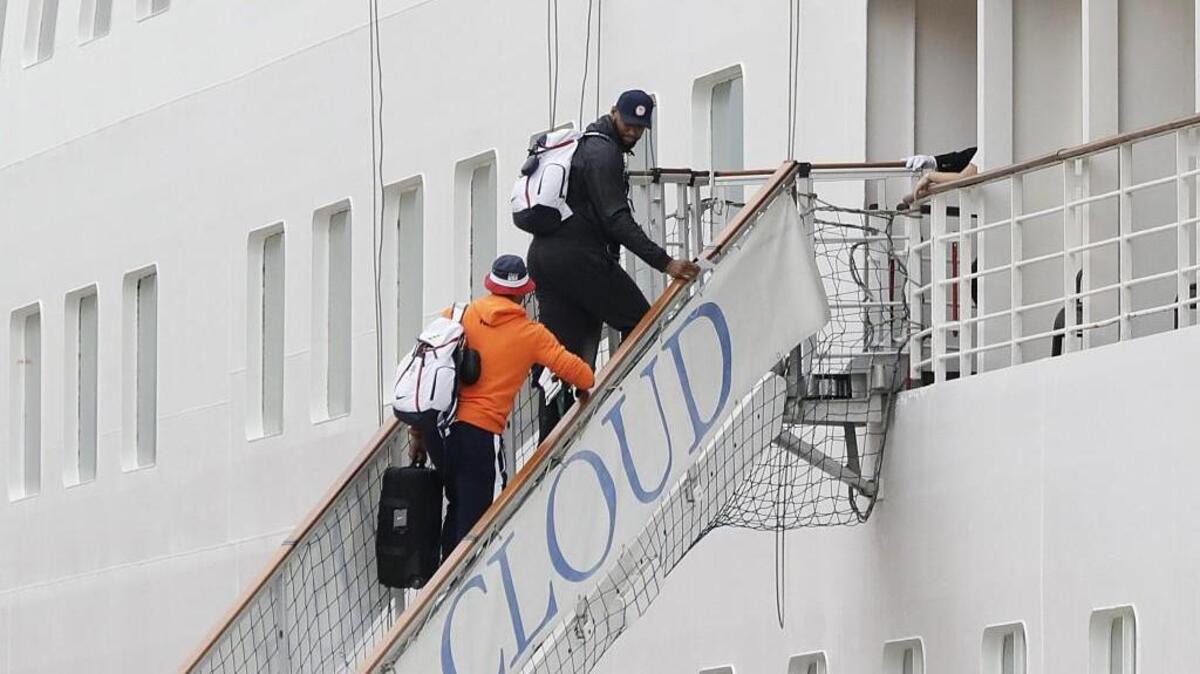 DeMarcus Cousins, right, and Carmelo Anthony, of the United States men's basketball team, board the Silver Cloud cruise ship upon arriving for the 2016 Summer Olympics in Rio de Janeiro, Brazil, last week.