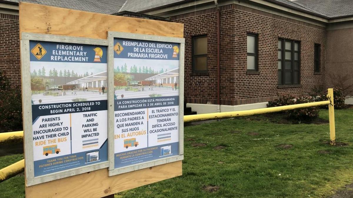 The old Firgrove School building peeks out as construction was about to get underway last year on a new school, which opened this fall.