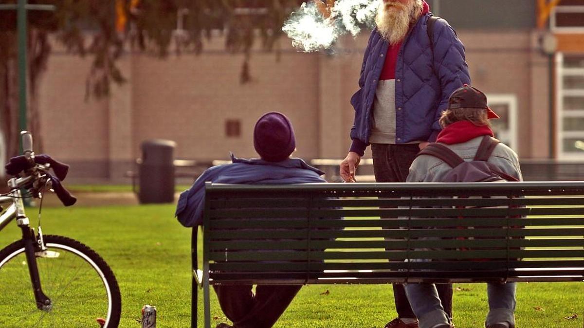 Three homeless friends hang out in Puyallup's Pioneer Park on a day that the Pierce County Coalition for the Homeless conducted its annual winter count of homeless individuals in 2005. All three men said they’d been camping in the Puyallup area.