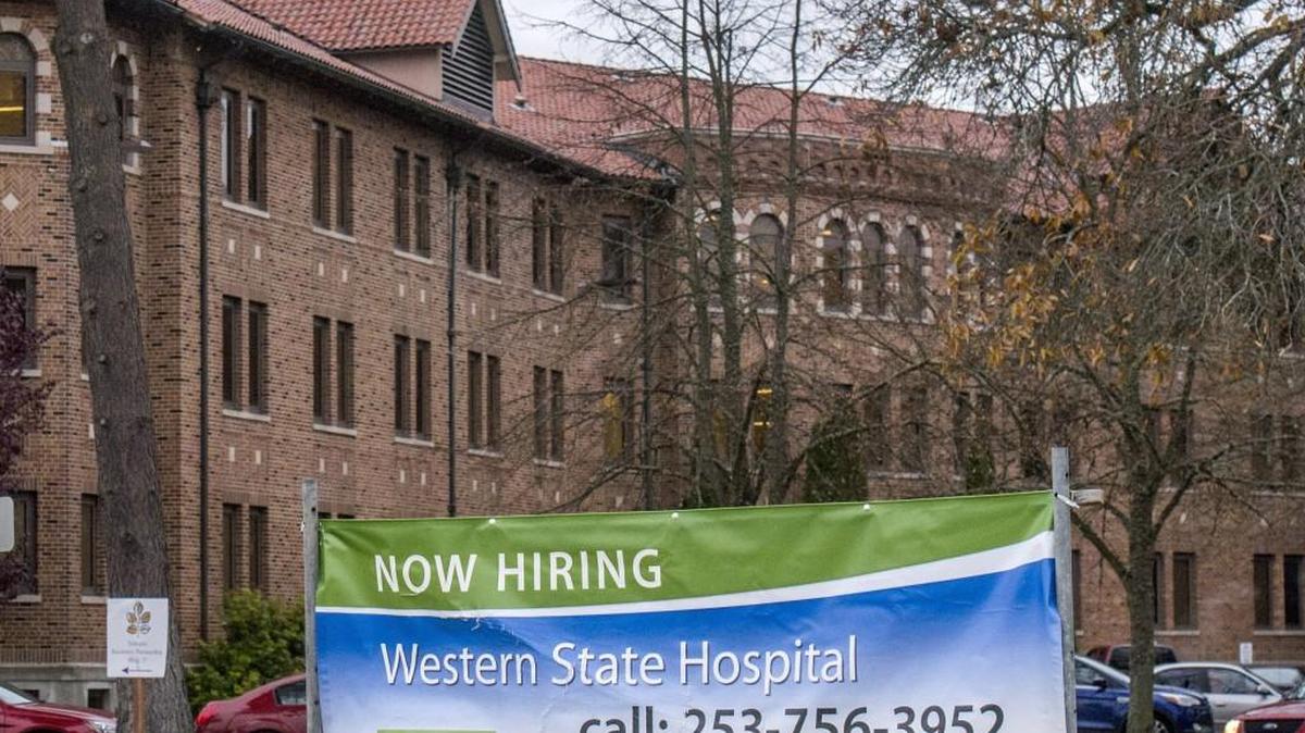 A help-wanted sign in front of Lakewood’s Western State Hospital last November speaks volumes about the the fragmented, understaffed safety net for mental health care in the region.