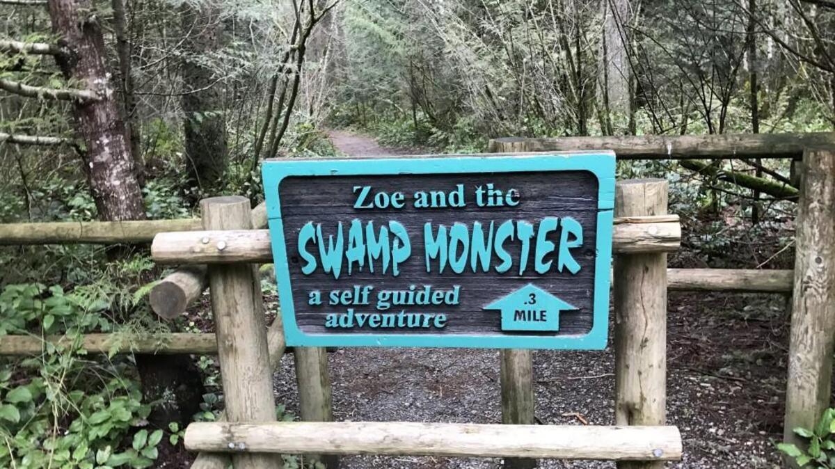 The Swamp Trail at Tiger Mountain State Forest is highlighted by a children’s story that’s told with signs along the path. The sign is misleading. The hike is 1.2 miles.