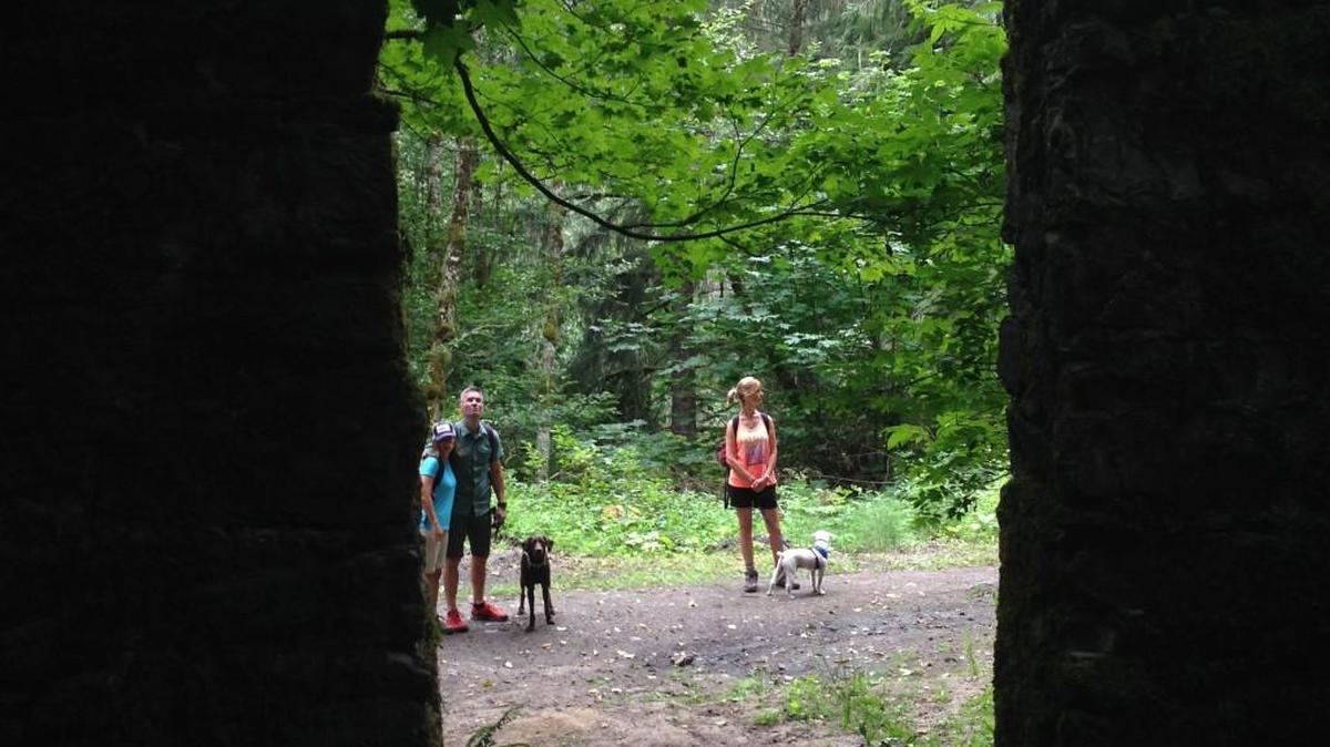 Hikers visit the remains of abandoned structures from the Carbon River Valley’s coal mining era.