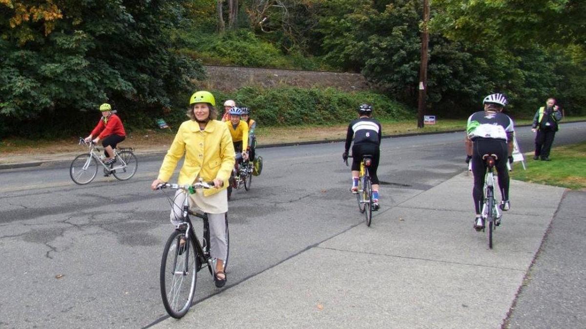 Tacoma’s Diane Wiatr, in yellow, took a position as the state Department of Transportation’s active transportation coordinator after eight years in the same position for the City of Tacoma.