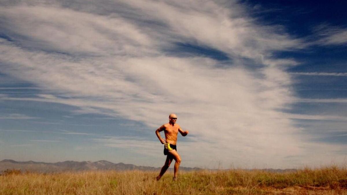 
Micah True runs across the northern Mexico landscape in a scene from a documentary film on his creation of the Copper Canyon Ultramarathon.
