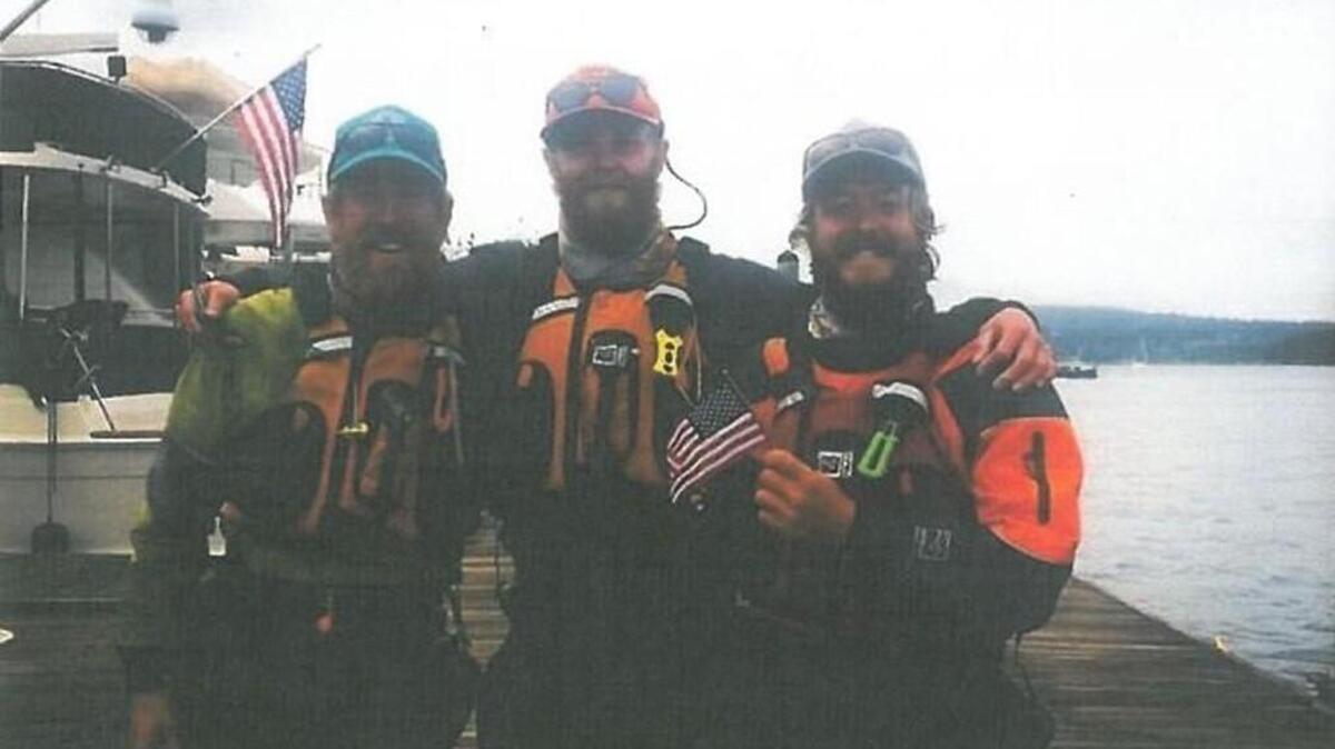 Kyle Cooper, from left, Matt Ryan and Daniel Walters spent the summer paddling the Inside Passage from Alaska to Washington.