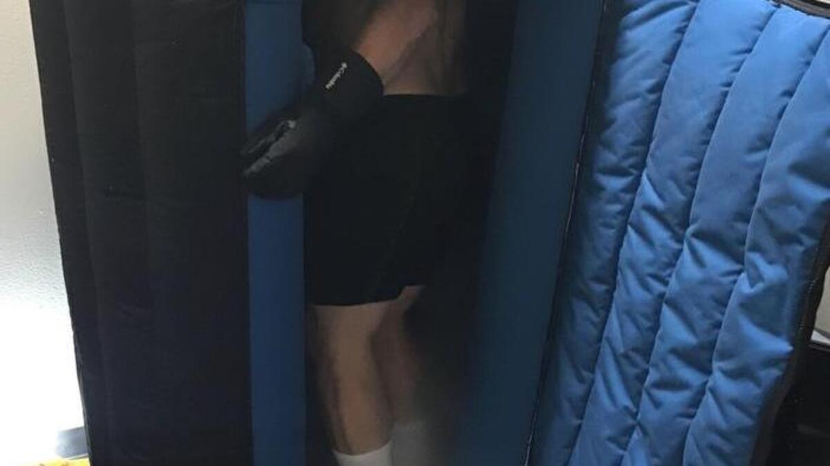 Innovative Fitness owner Jesse Ewell begins a cryotherapy session at his Gig Harbor training studio.