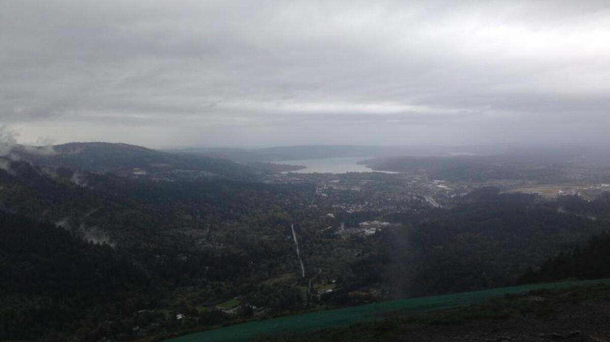 Sometimes even on rainy days hikers are rewarded with a view of Issaquah and Lake Sammamish when they reach the top of Poo Poo Point.