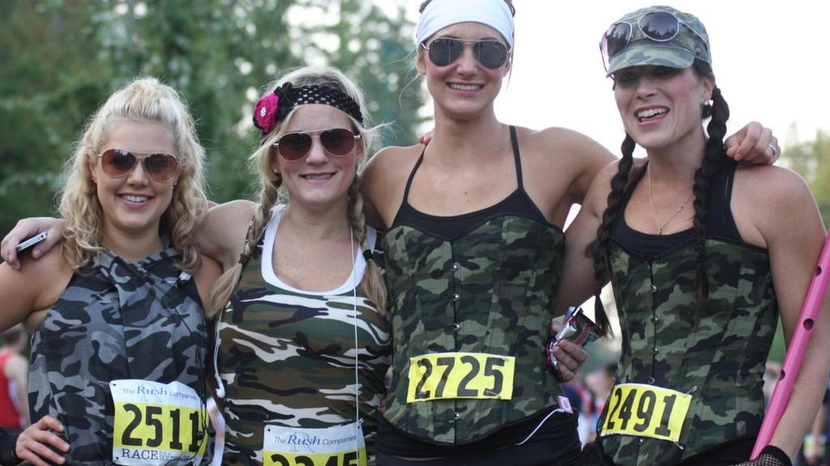 Sabrina Seher, at center with white headband, with 2012 half-marathon running mates, from left, Kristine Mauss, Aimee Hentschell and Heather MacPhee.