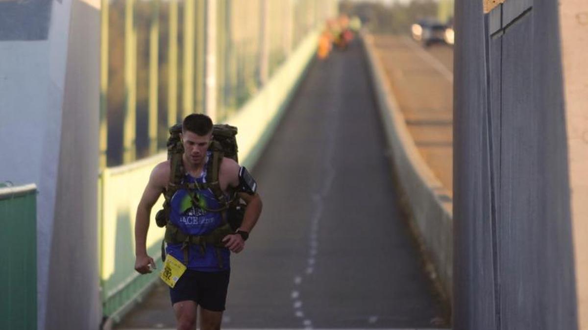 Martin Park ran the May 1 Tacoma City Marathon while carrying a 48.5 pound pack. It was his first marathon, and he was raising money for the Permission to Start Dreaming Foundation.