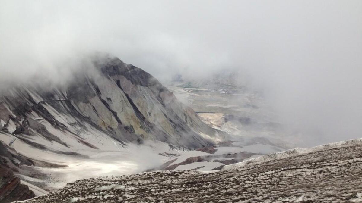 A view from the Mount St. Helens crater rim on a cloudy summer morning.
